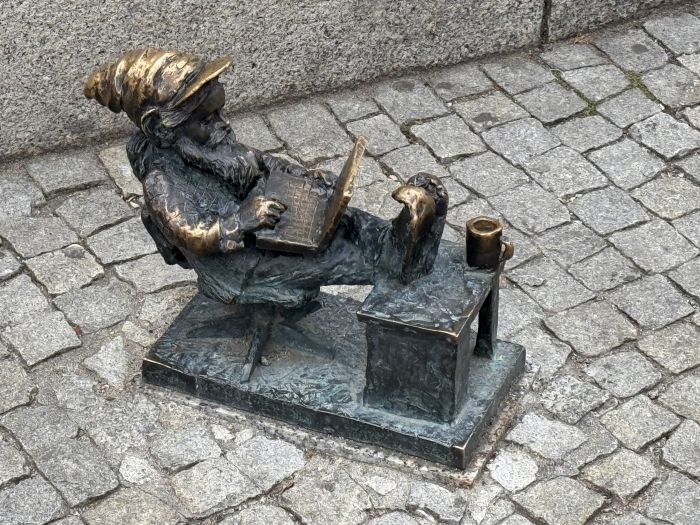 A small statue of a dwarf in the city of Wrocław, Poland.